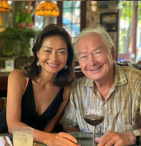 PinayPal Dating App - A Happy Couple, Maria and John, Smiling Together, Celebrating Love and Meaningful Connections.